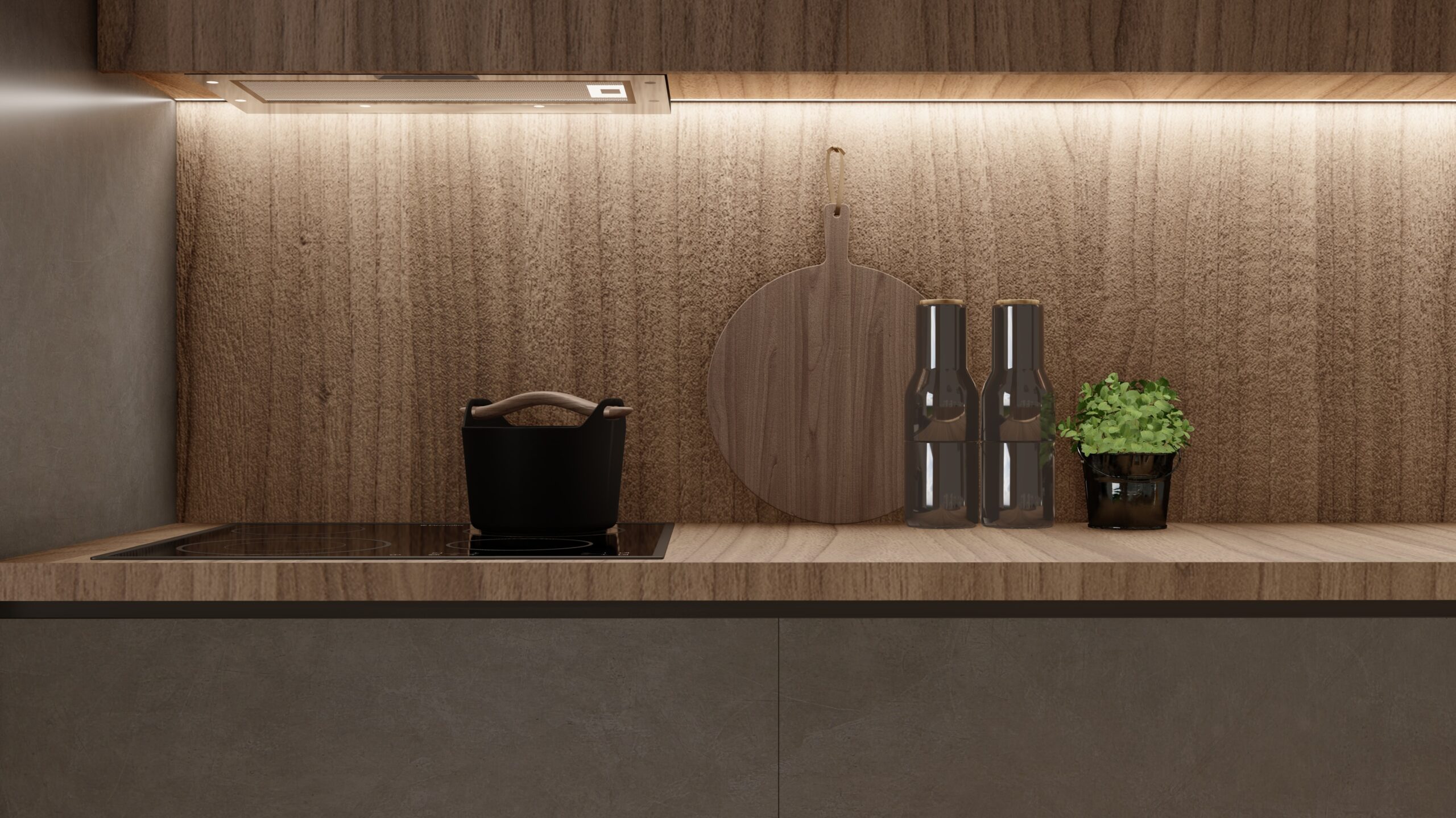 a kitchen counter with a potted plant and a cutting board