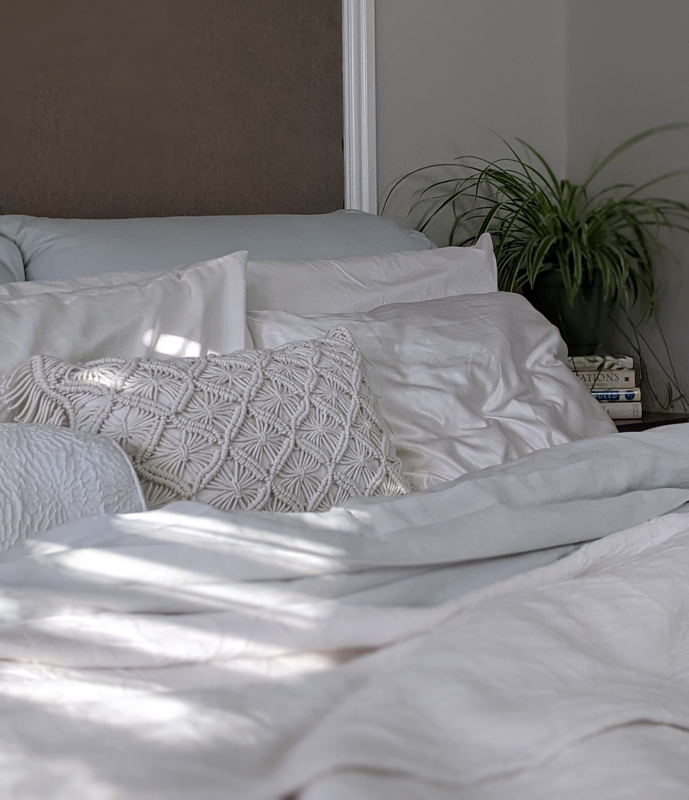 white and gray bed linen